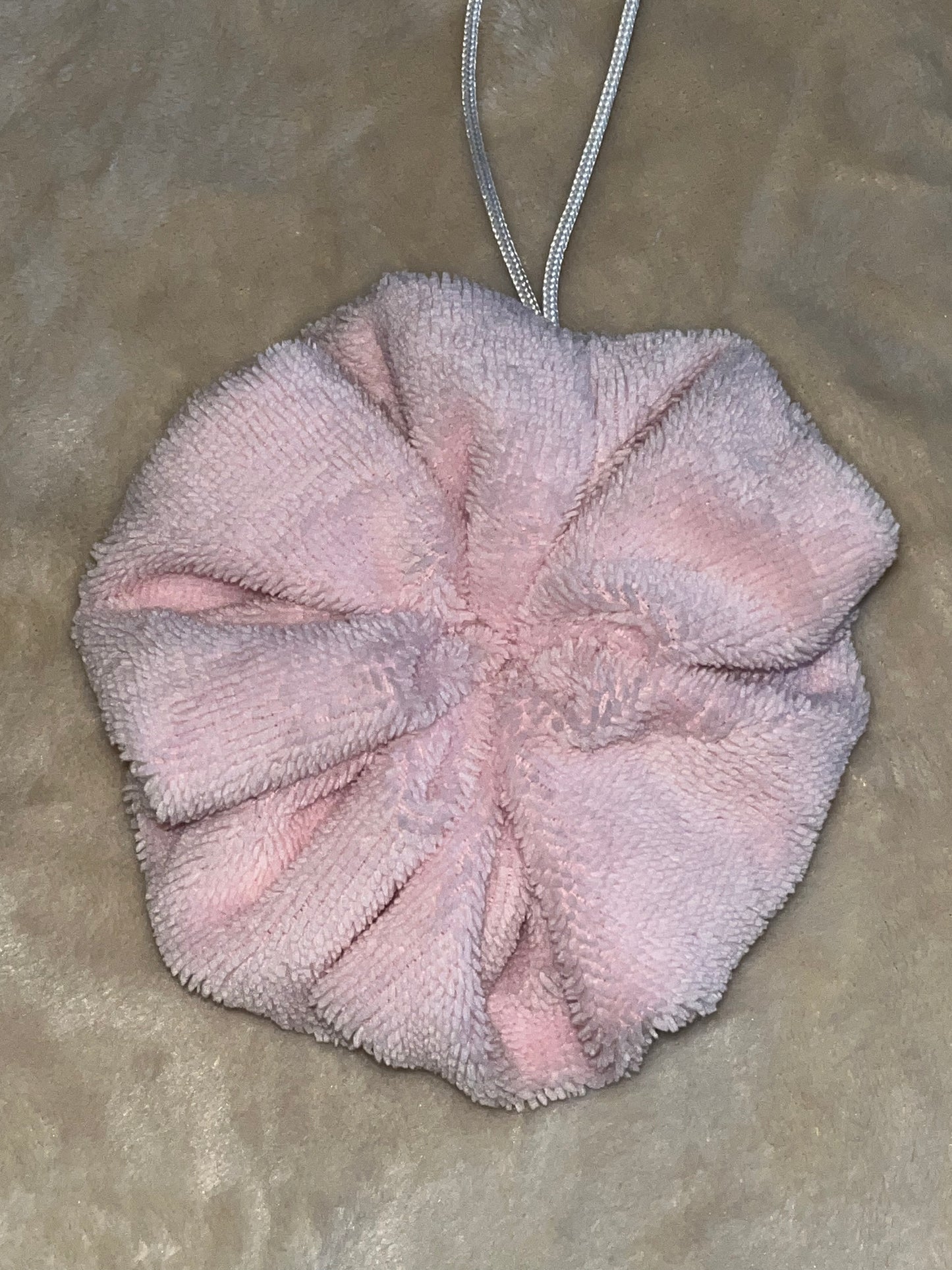 Fleur de douche lavable